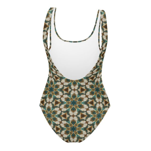 gold star geometry swimsuit, shades of gold and blue create flower like tile patterns